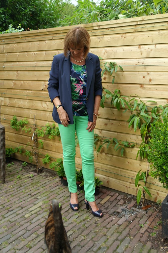 Blue Kenzo jacket with green and yellow skinnies