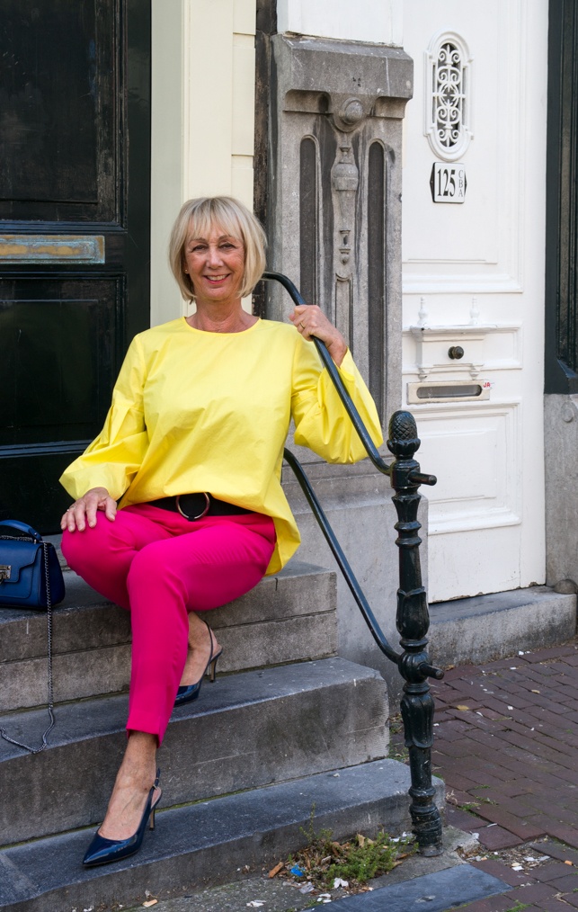 A pair of bright pink trousers, worn three ways - No Fear of Fashion