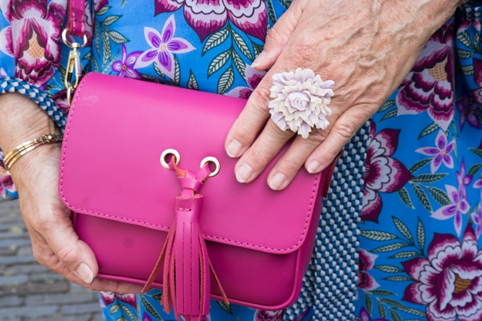 Fuchsia bag and lavender ring