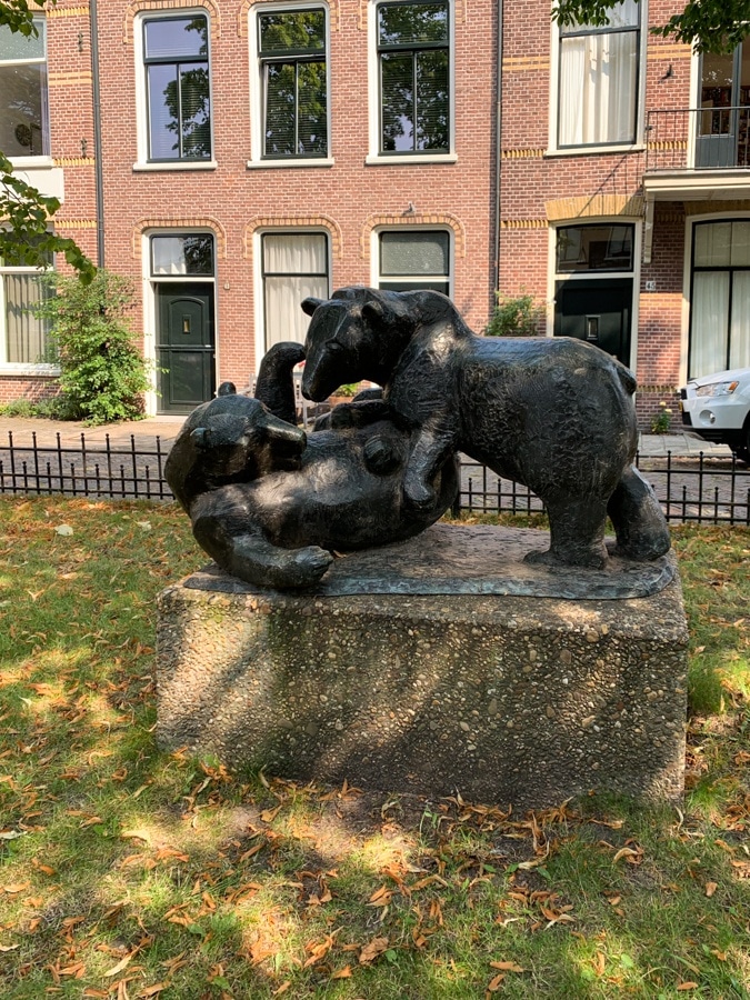 Two bears playing or fighting