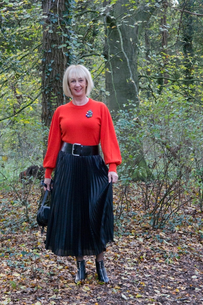 Red jumper on black pleated skirt - No Fear of Fashion