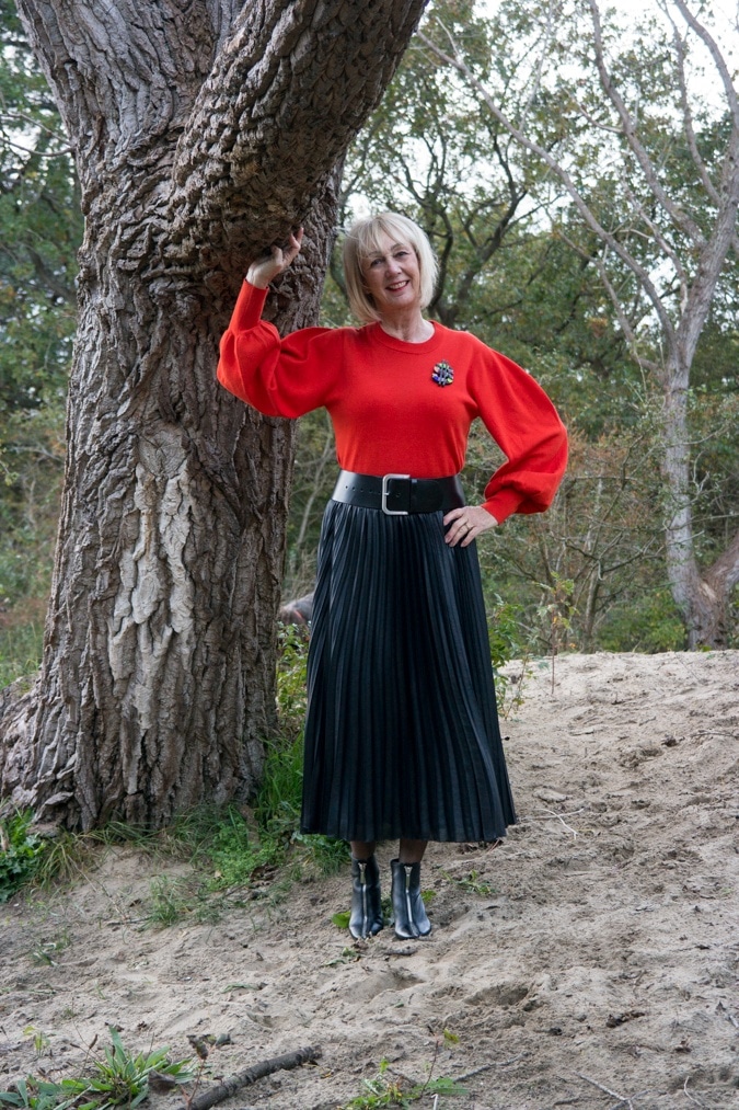 Red jumper on black pleated skirt - No Fear of Fashion