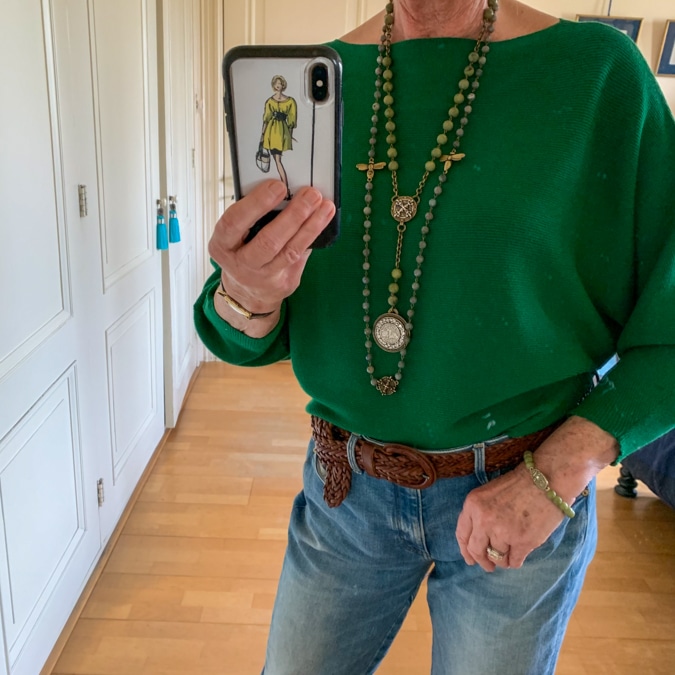 Green jumper with French Kande necklaces and bracelet