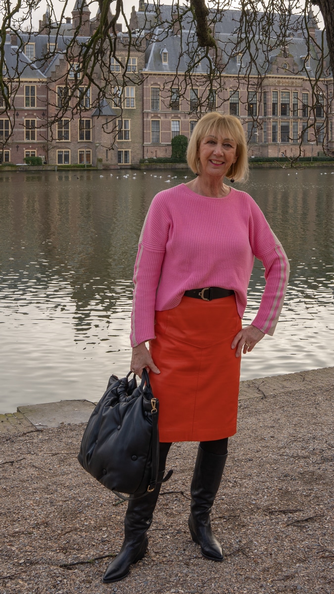Orange leather skirt with pink jumper