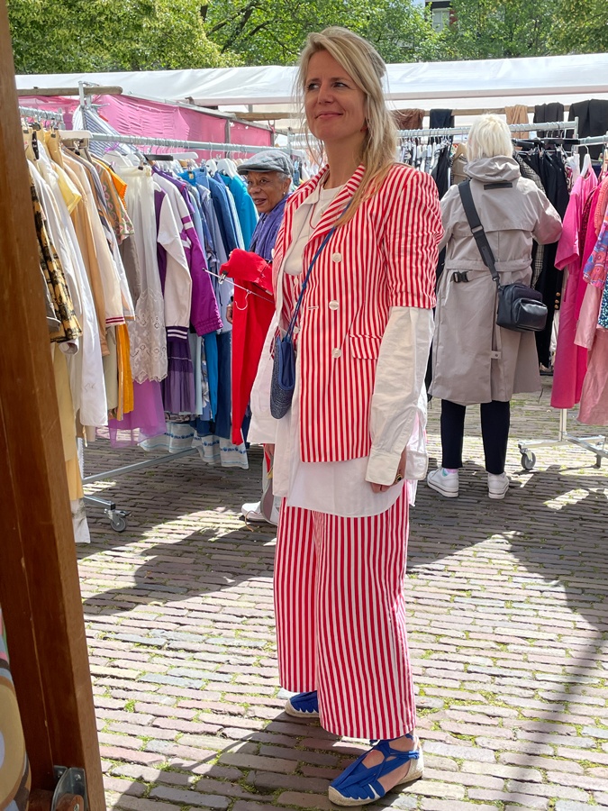 red and white suit on market lady