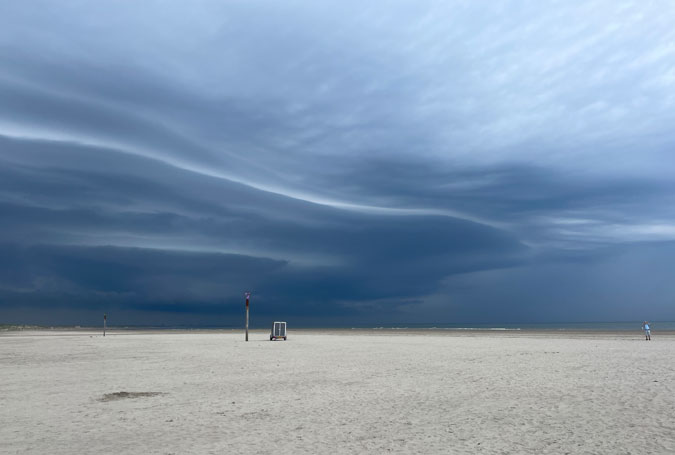 beach with dark skies