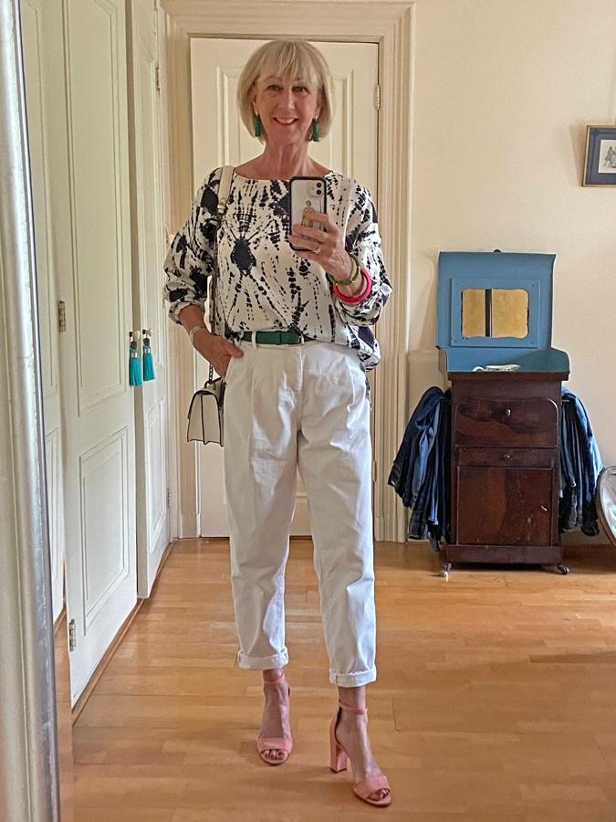 White trousers with a blue and white top