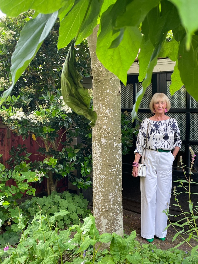 White wide leg trousers with a blue and white top