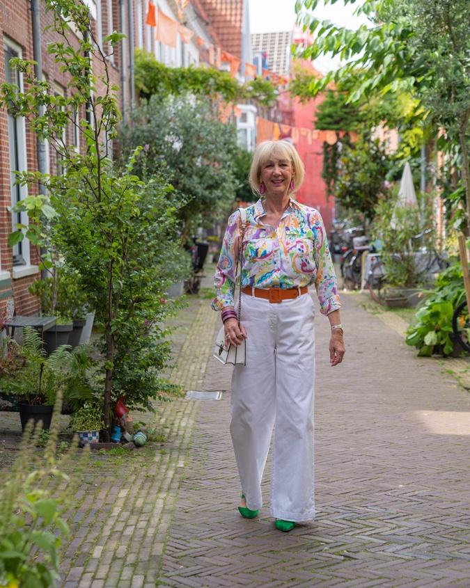 White wide leg trousers with a colourful shirt