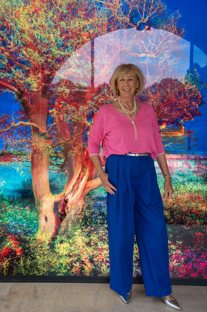 bright blue trousers with a pink top