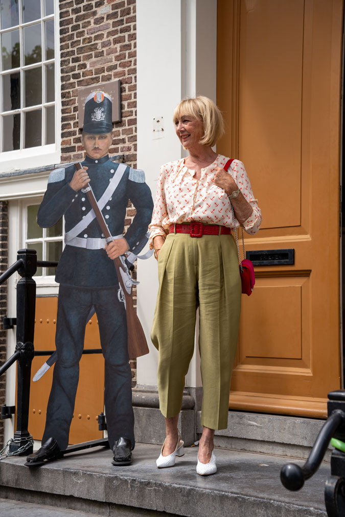 Green trousers with an anchor blouse