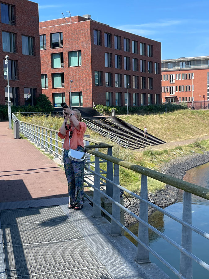 Marjolein standing on a lock bridge