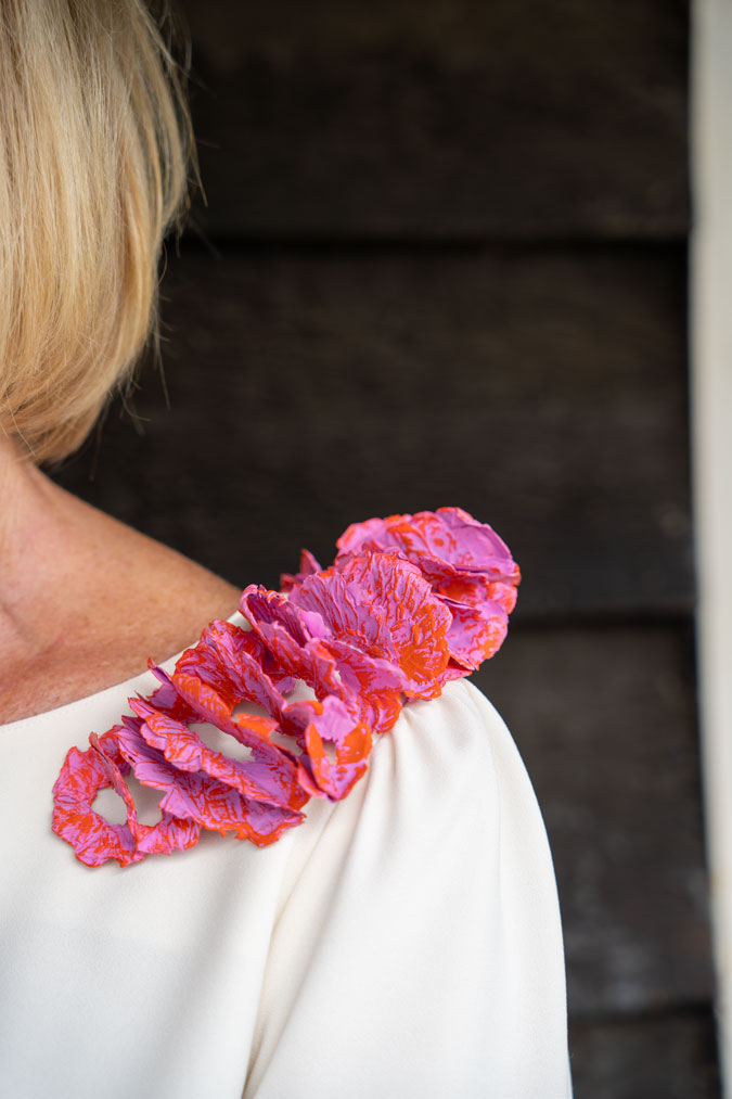 Pink and orange brooch