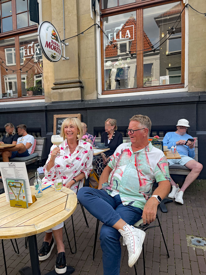 Ron and me on a terrace with a pina colada